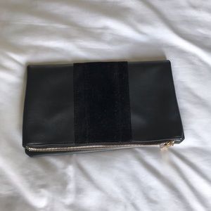 Black fold over clutch with gold zipper